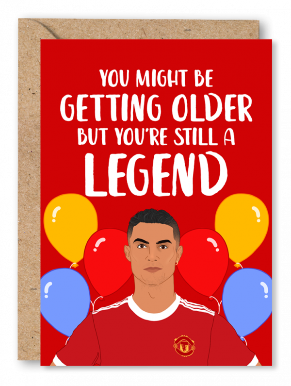 A red Birthday card featuring an illustration of footballer Cristiano Ronaldo with balloons in the background. White text above reads ‘You might be getting older, but you’re still a legend’